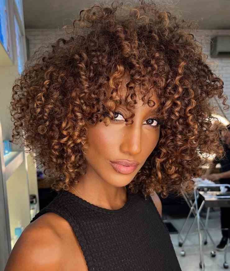 afro e fronte alta