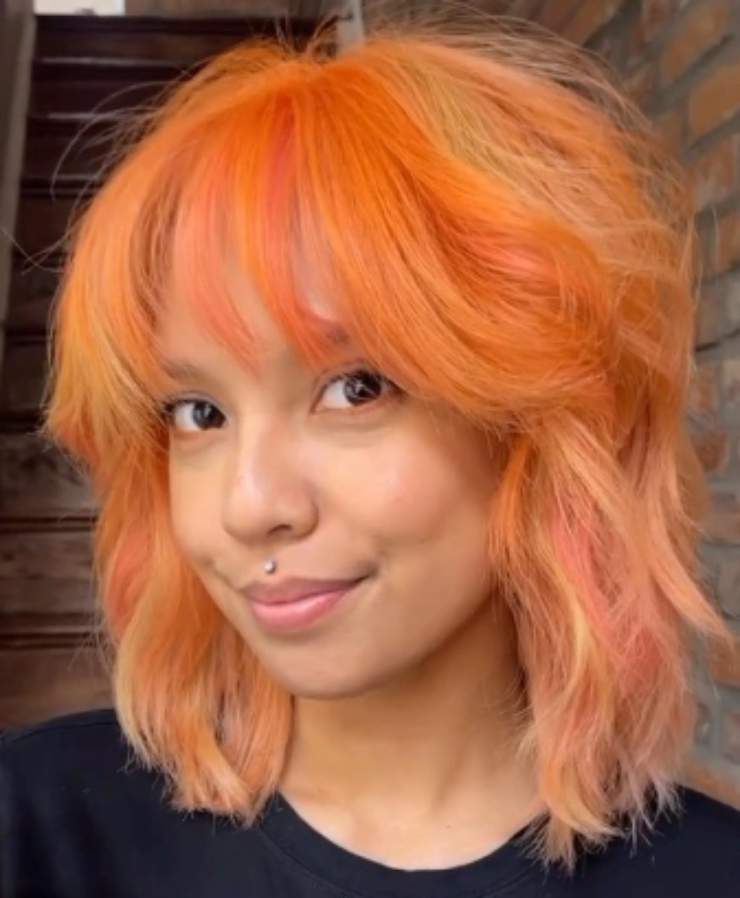 Come può tagliare i capelli chi ha la fronte alta